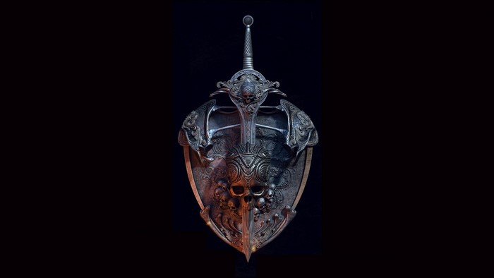 Ornate shield and sword with skull motifs
