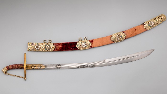 Antique jeweled saber with scabbard