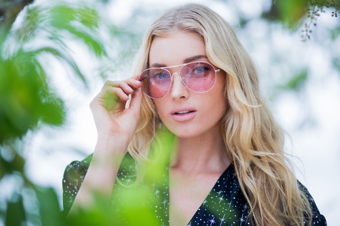 Elsa Hosk wearing pink sunglasses