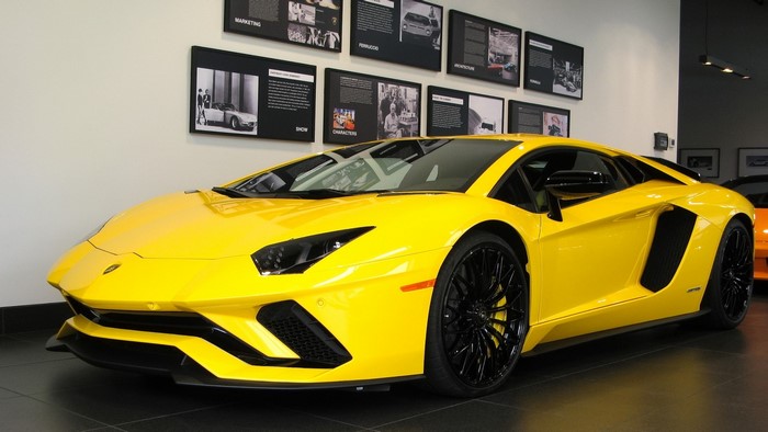 Yellow Lamborghini Aventador in showroom