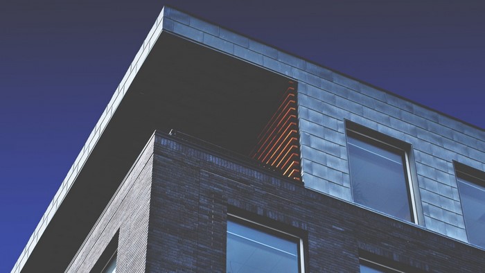 Modern Building with Dark Brick and Metal Facade