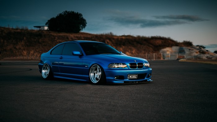 Blue BMW E46 Coupe on a Racetrack