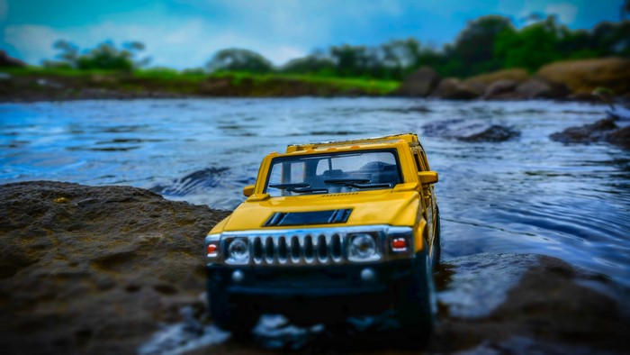 Yellow Hummer Miniature in Water