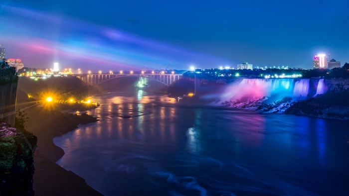 Niagara Falls at Night with Bridge and City Lights