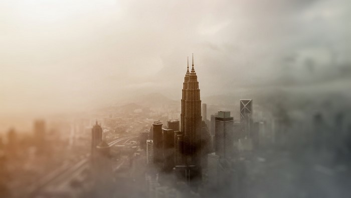 Petronas Towers in foggy Kuala Lumpur