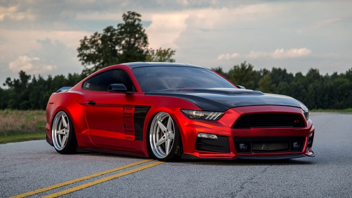 Red Ford Mustang with custom modifications