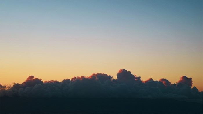 Clouds at sunset with pink highlights