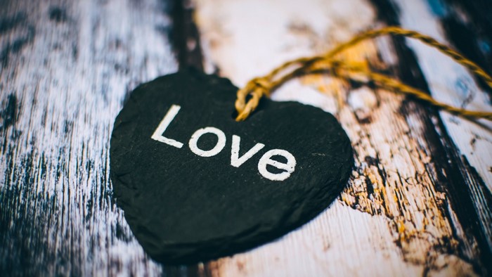 Heart-shaped slate with the word "Love"