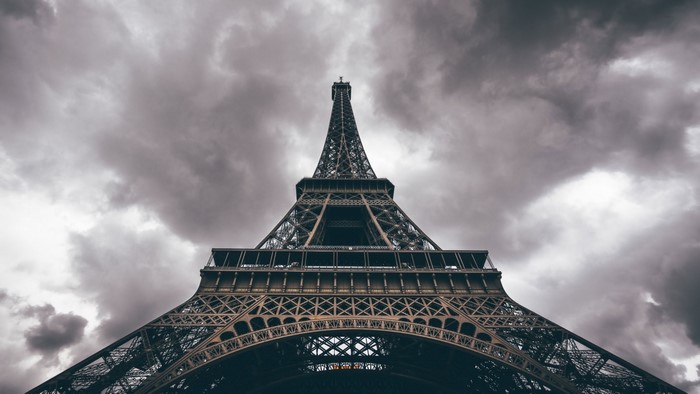 Eiffel Tower against a cloudy sky