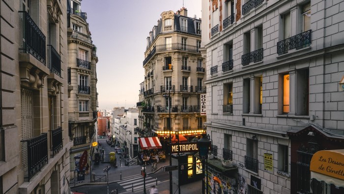 Paris street with buildings and hotel