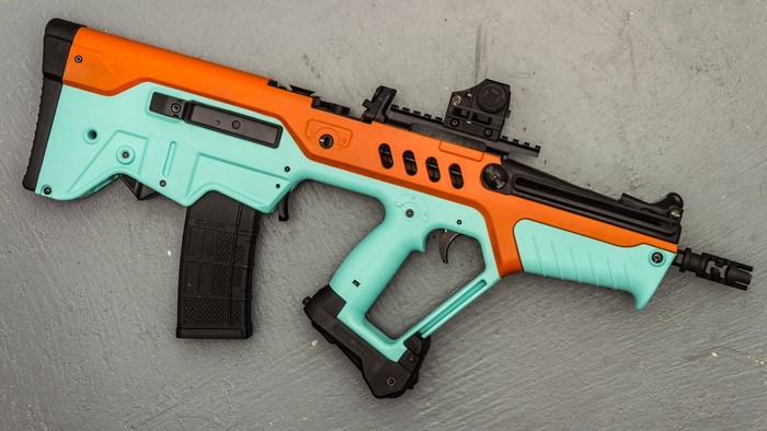 IWI Tavor SAR 16 rifle with red dot sight