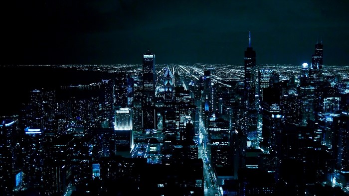 Nighttime Cityscape with Illuminated Skyscrapers