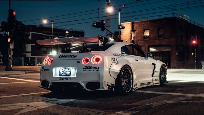 White Nissan GTR with large spoiler