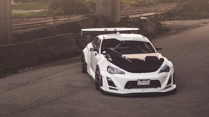 White Toyota GT 86 with a large rear spoiler
