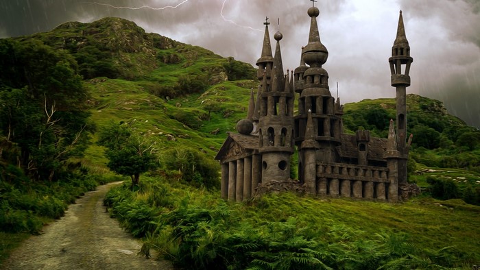 Gothic castle on a stormy hill