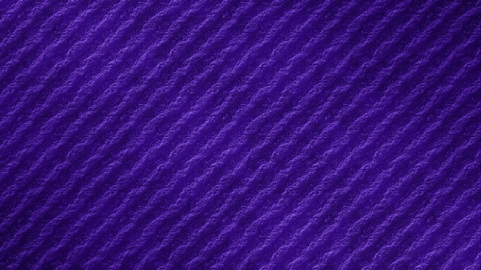 Purple textured surface with diagonal ridges