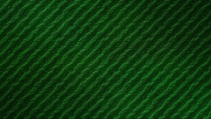 Green textured surface with diagonal lines