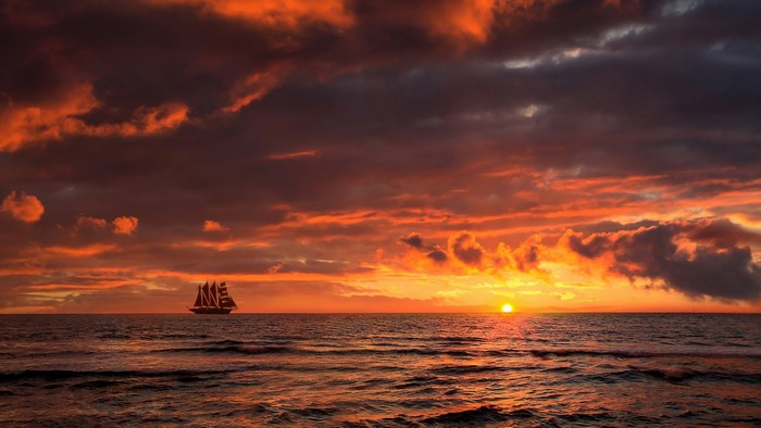 Sailboat on the sea during sunset
