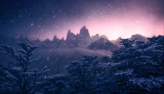 Fitz Roy mountains during a snowfall at sunset