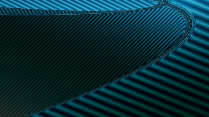 Abstract blue and green carbon fiber texture