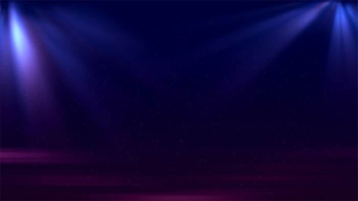 Blue and purple light beams on a dark background