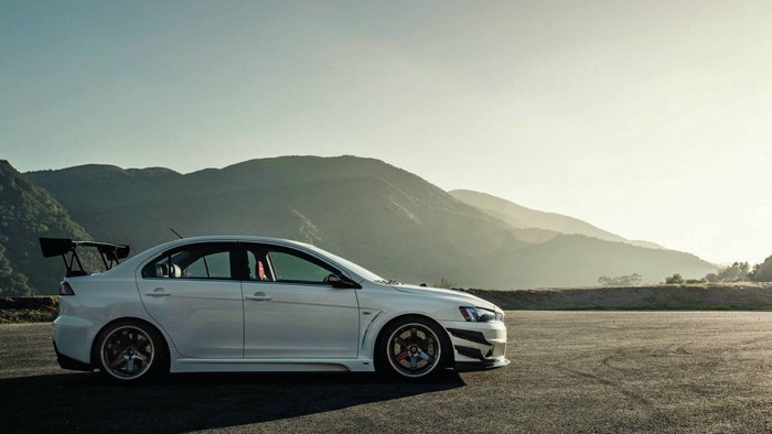 White Mitsubishi Lancer Evolution X with Spoiler
