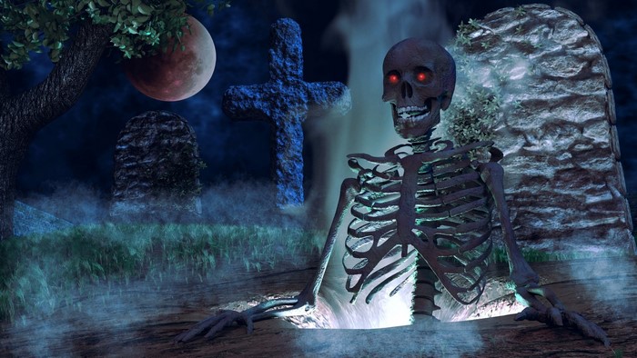 Skeleton rising from grave on Halloween night