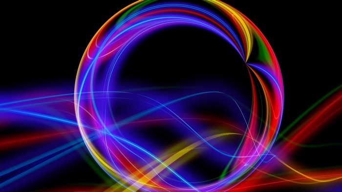 Abstract colorful light trails forming a sphere