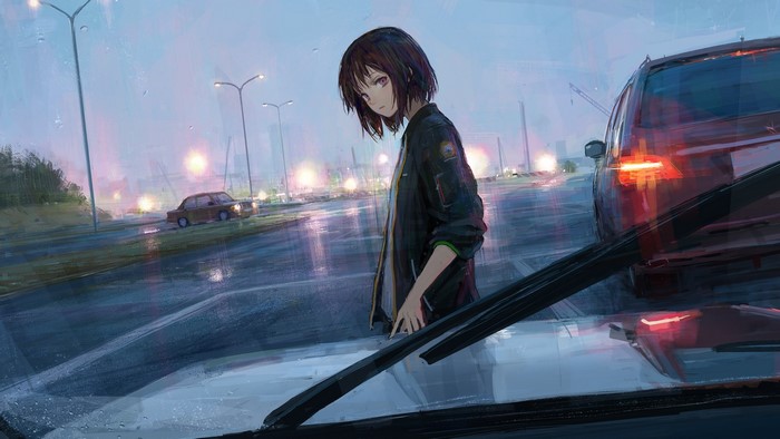 Girl on a rainy road at night