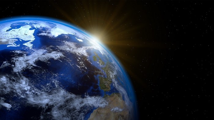 Earth from space with sunrise over Europe