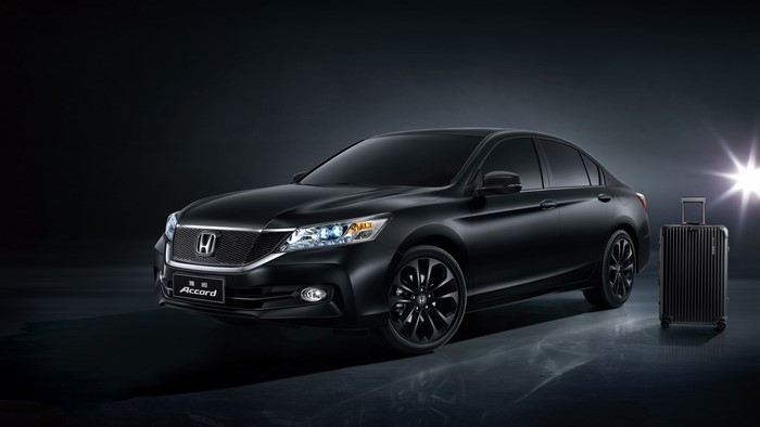 Black Honda Accord with Luggage