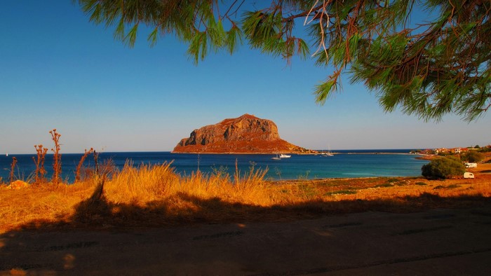 Monemvasia island and coast with pine branches