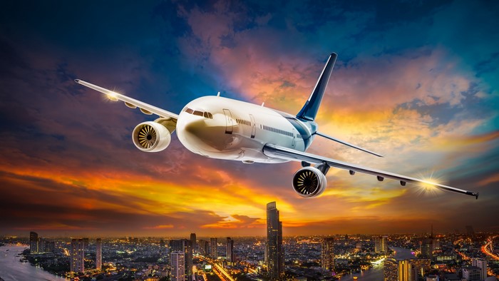 4K Modern Airplane Flying Over Cityscape