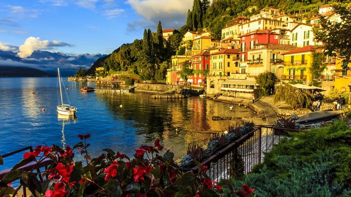 Lake Como with Sailboat and Colorful Buildings