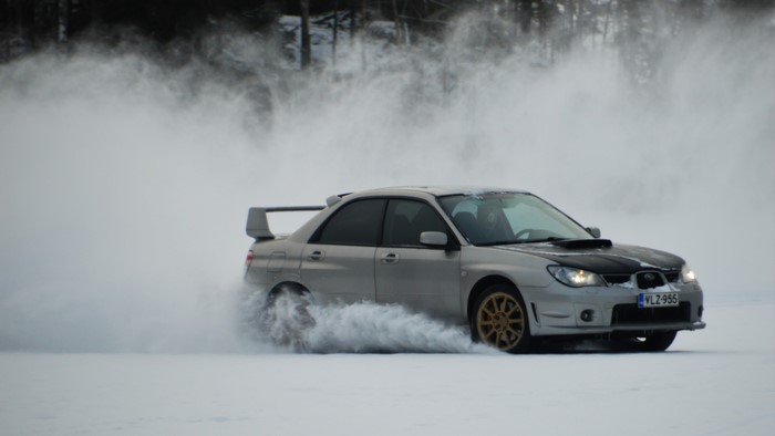 Subaru Impreza WRX STI drifting on snow