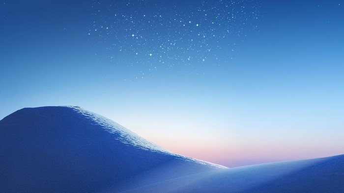 Blue dunes under a starry sky