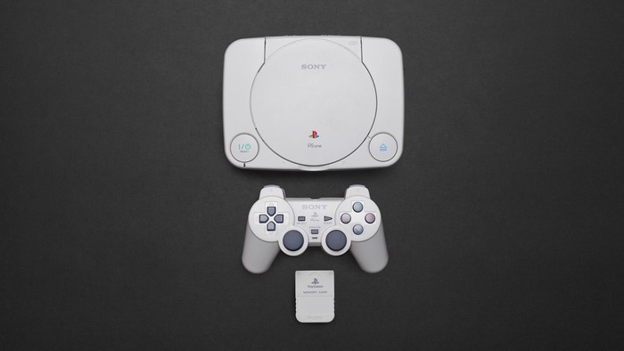 Sony PlayStation PSone console with controller and memory card