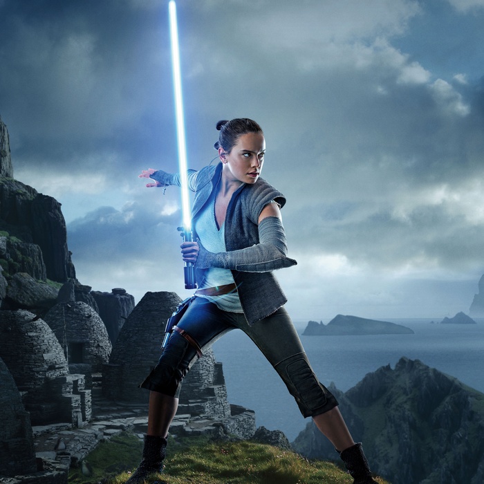 Rey from Star Wars: The Last Jedi with a lightsaber