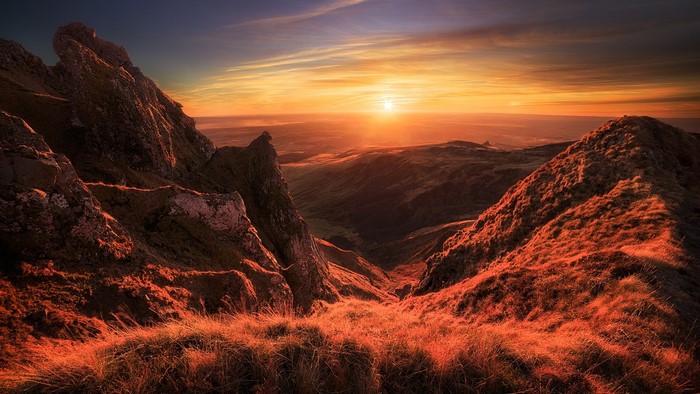 Sunset over mountainous landscape