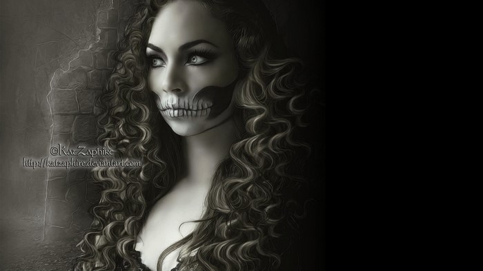 Woman with skull face paint and curly hair
