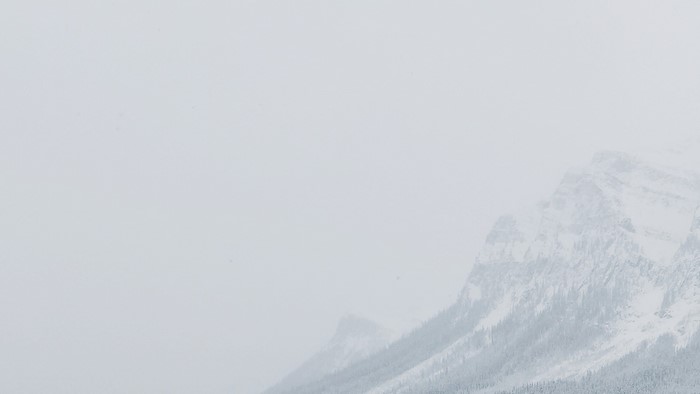 Snowy Mountains in Fog