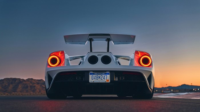 White Ford GT car with large rear spoiler