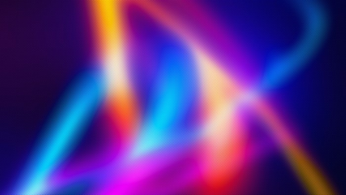 Abstract colorful light streaks on dark background