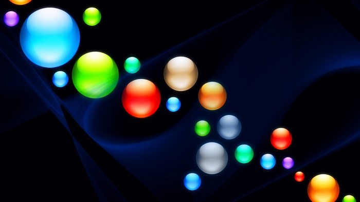 Colorful glowing balls on dark background