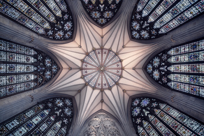 Interior Ceiling of a Cathedral with Stained Glass Windows