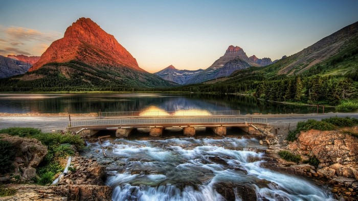Mountain Lake with Bridge and Waterfall