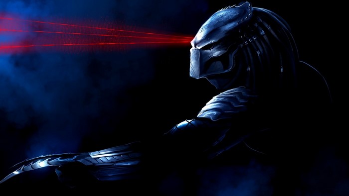 Predator aiming with red laser sight