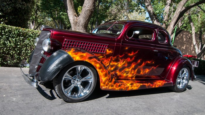 Custom hot rod car with flame paint job