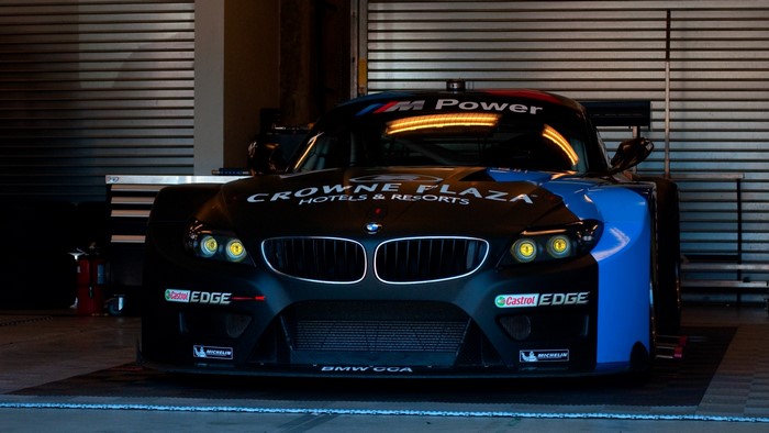 BMW M Power race car with Crowne Plaza livery