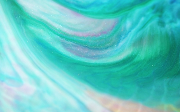 Abstract swirling green and blue glitter stream
